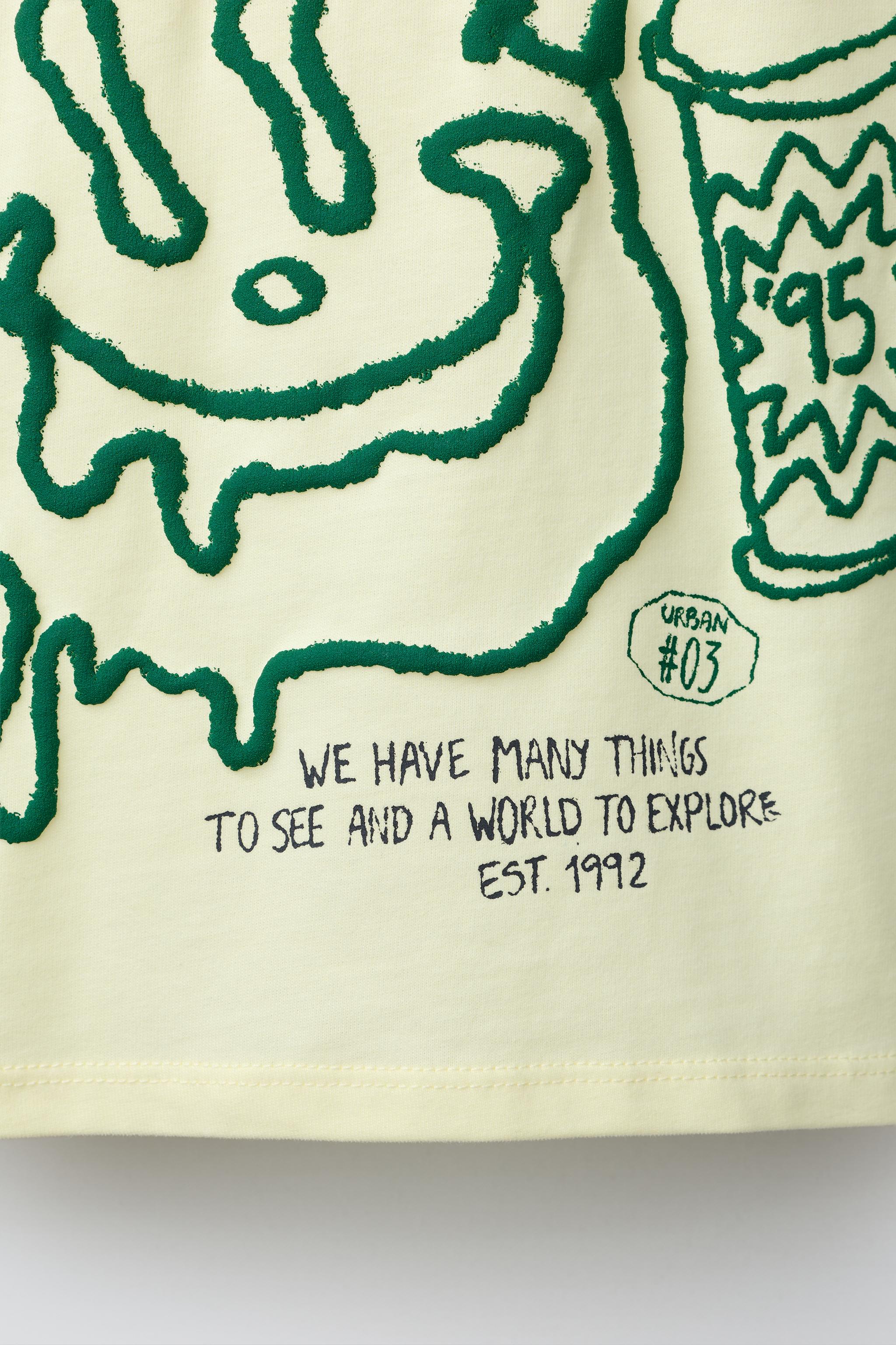 T-SHIRT IMPRIMÉ GRAFFITI